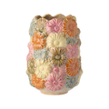 Vase mit pastellfarbenen Blumen