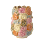Vase mit pastellfarbenen Blumen