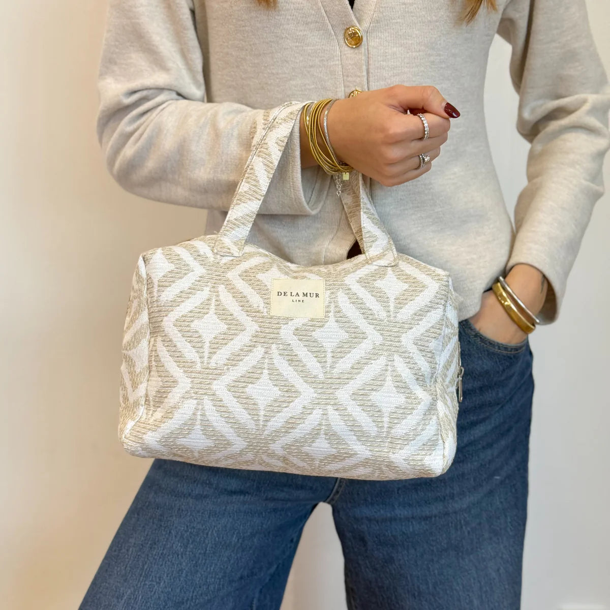 Tasche mit Tragegriffe beige gemustert